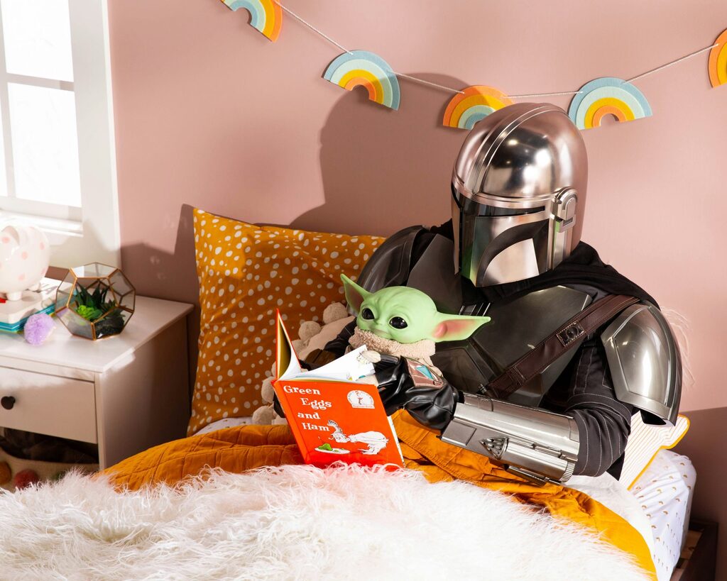 Star Wars inspired scene with Mandalorian reading to Baby Yoda, used as a May the 4th tie-in to illustrate storytelling as a key to content marketing success.